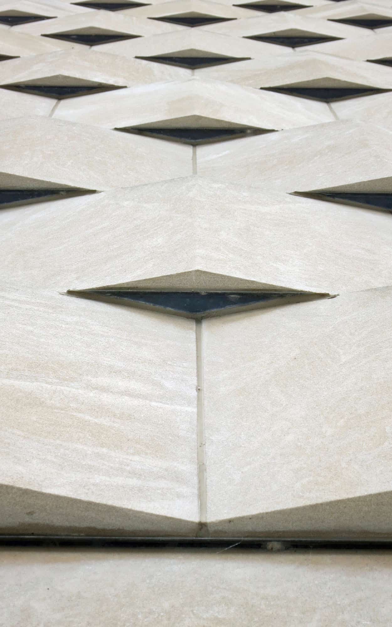 The limestone cladding of the justice building with its subtle basket-weave effect