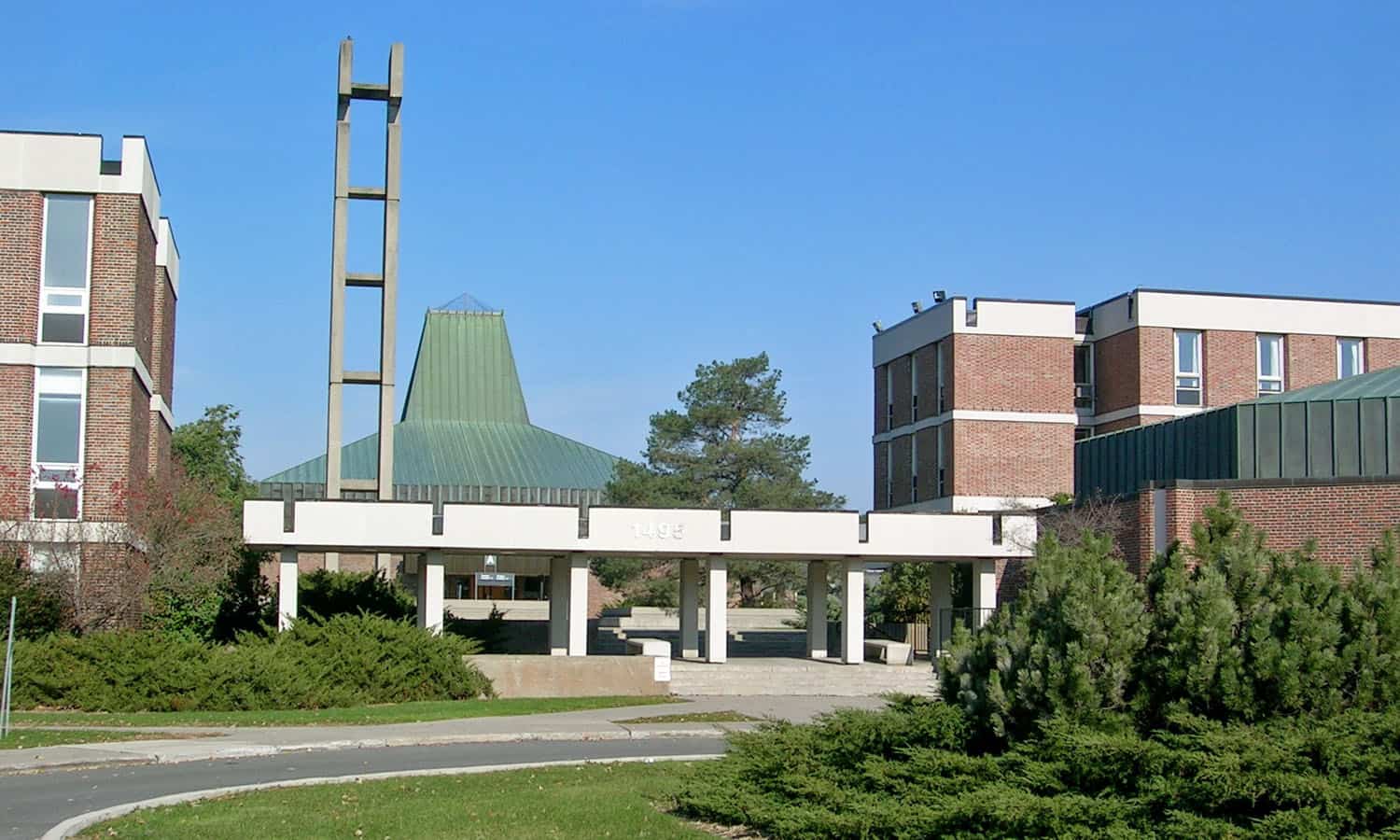 The main entrance to campus with the former chapel beyond