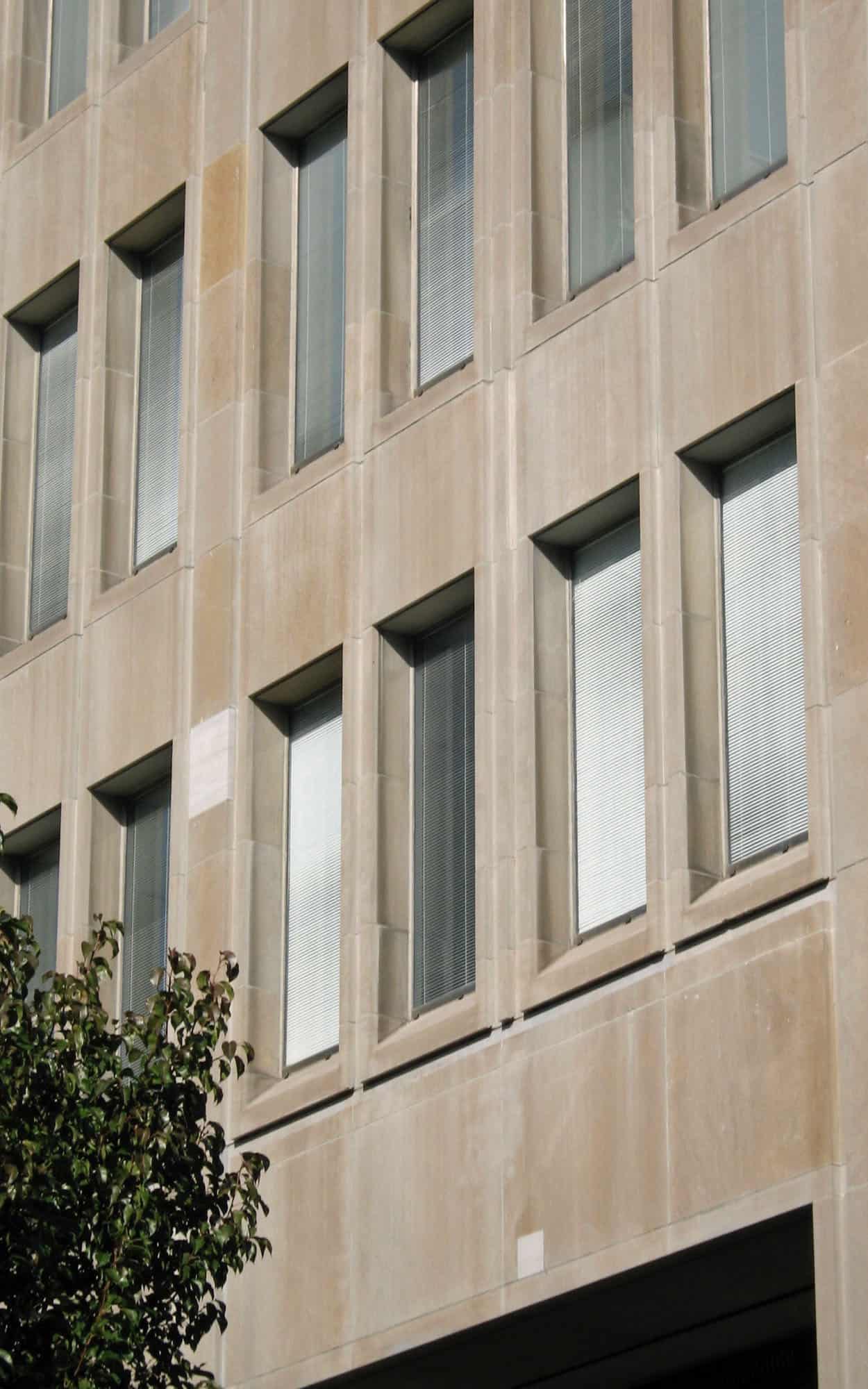 The limestone curtain wall of the office towers