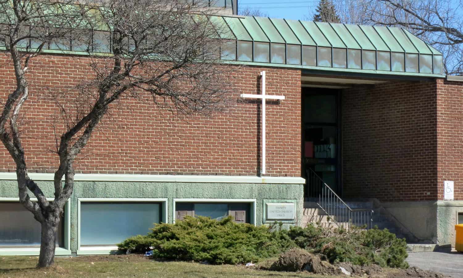 The entrance from Maitland Ave. is a void within the brick ground floor