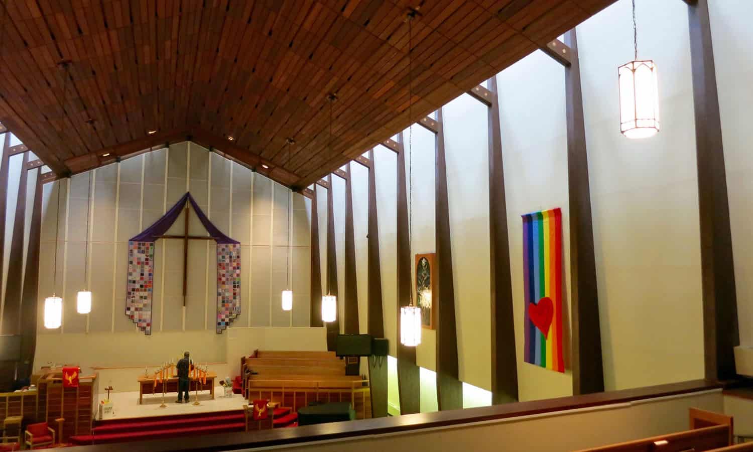 The sanctuary with its floating wood ceiling and indirect natural lighting